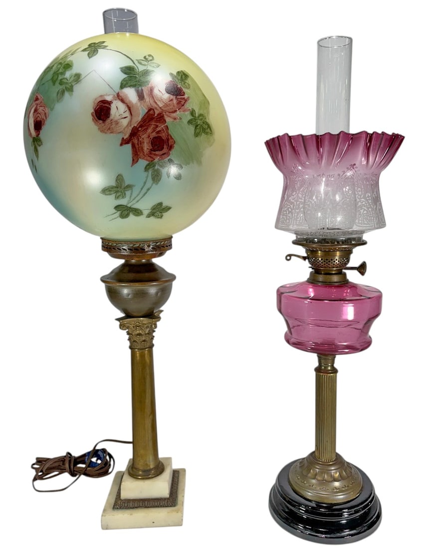 Vintage Table Lamps Oil & Floral Glass 2pc LOT: Lot of two vintage table lamps. Includes one Victorian style kerosene oil lamp featuring a cranberry glass font, embossed frosted glass shade with cranberry ruffled rim, clear glass chimney, brass-ton