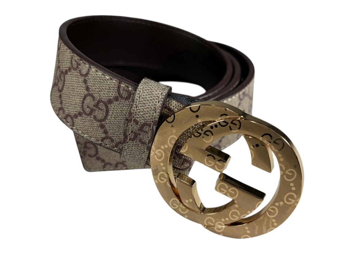 Designer Style Monogram Belt Size 46 with Box: Designer style monogram belt featuring a beige and brown repeating pattern with a large gold-tone double-letter buckle. Interior is stamped "Made in Italy" with a reference number and marked size 46/1