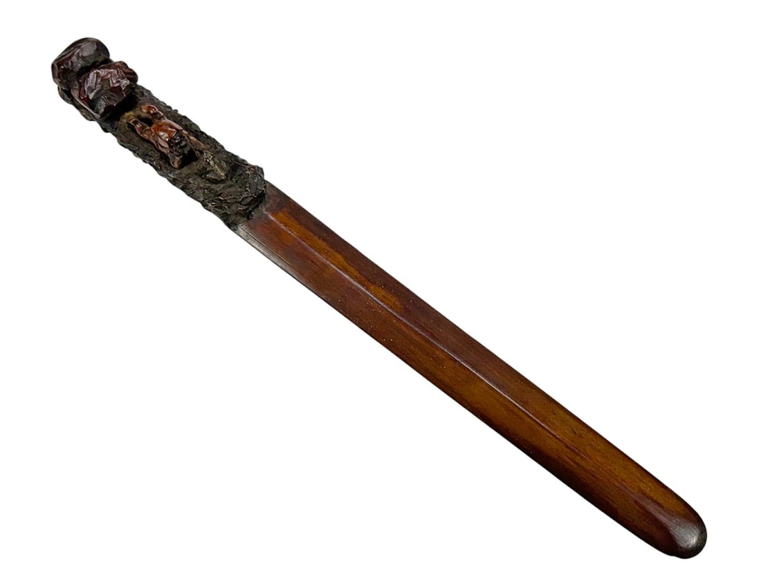 European Carved Wood Figural Letter Opener Knife: European carved wood letter opener featuring a hand-carved figural scene depicting a seated elderly man with a small animal among rocky outcroppings. Carved from a single piece of hardwood with engrav
