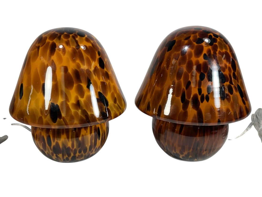 Art Glass Mushroom Accent Lamps 2pc LOT: Pair of art glass mushroom-form accent lamps featuring an amber tortoiseshell pattern with hand-blown style organic spotting throughout. Each lamp has a two-piece glass shade and body with an internal