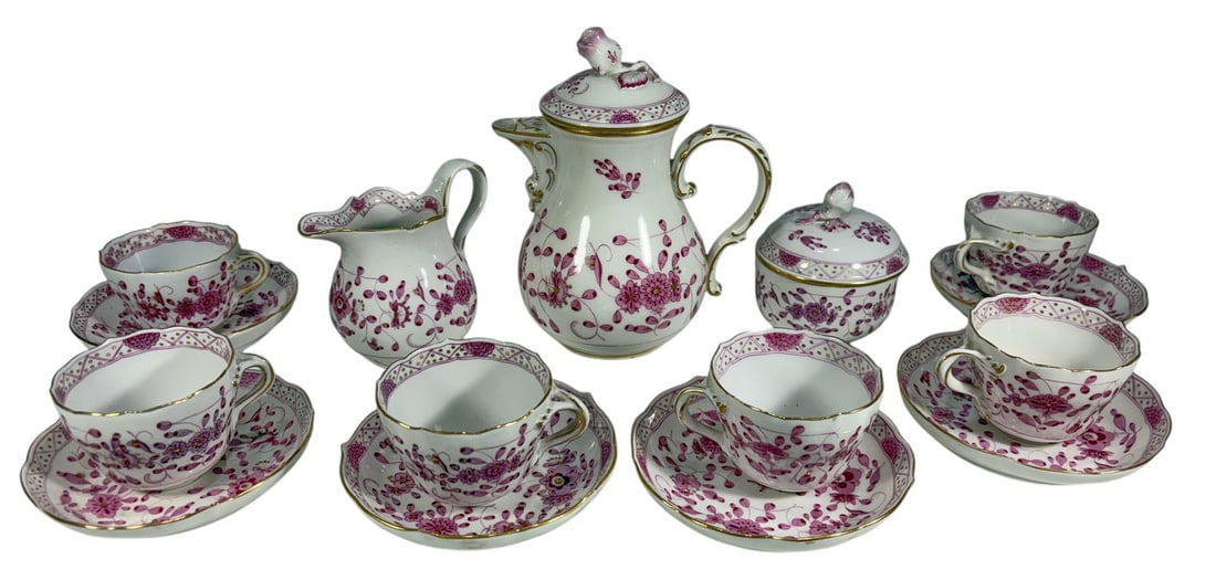 Meissen Indian Pink Porcelain Tea Set 15pc LOT: Fifteen-piece Meissen porcelain tea service in the Indian Pink (Indische Purpur) pattern. Decorated with pink floral and scrolling foliate motifs, gilt accents, and shaped rims. The lot includes a cov