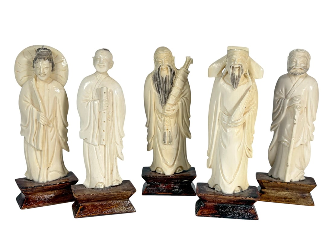 Carved Oriental Scholar Figures on Wood 5pc LOT: Lot of five carved Oriental scholar figures, each mounted on a carved wood base. The group depicts various standing scholars and sages in flowing robes holding traditional attributes. No visible maker