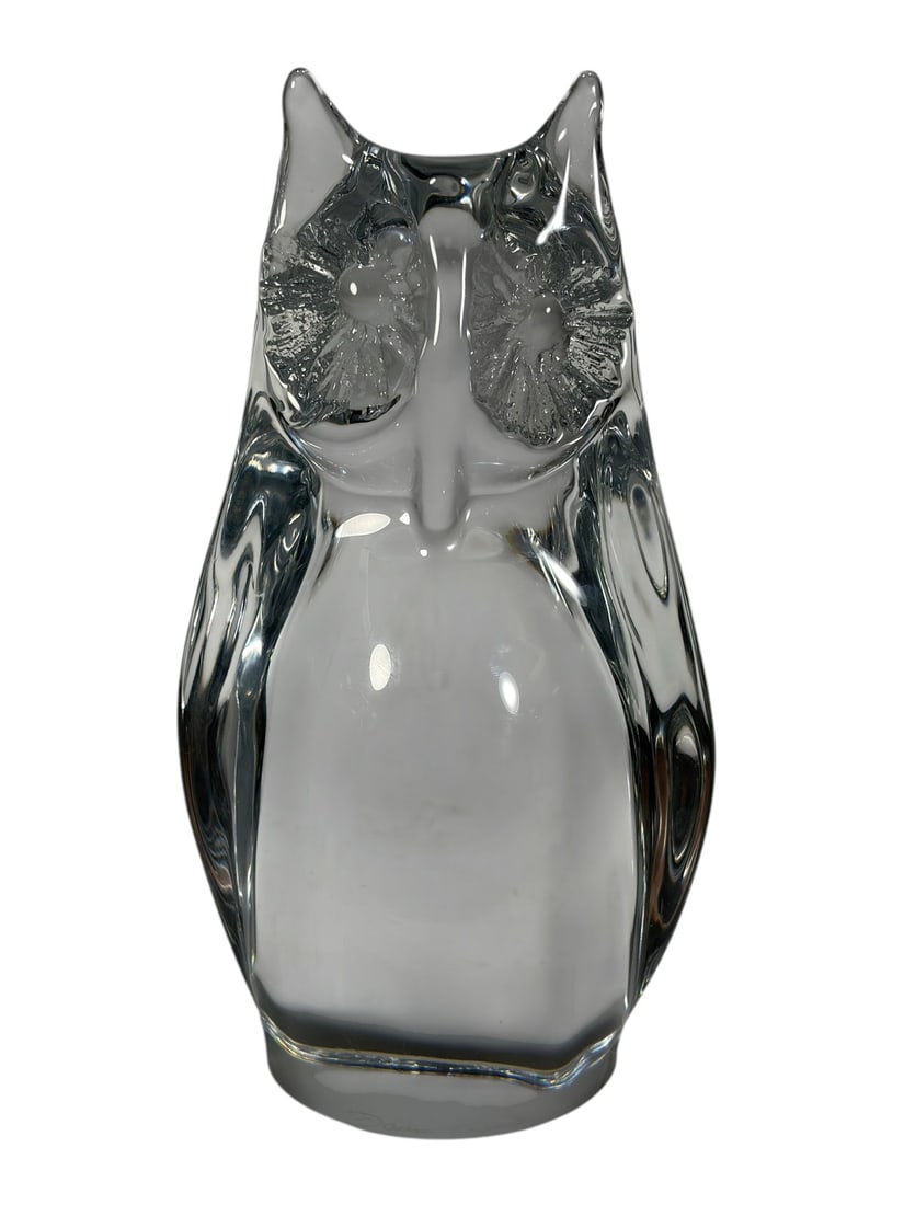 Daum France Crystal Owl Sculpture Signed Clear: Signed Daum France clear crystal owl sculpture with a stylized modernist design, deeply textured eyes, and a polished finish. Acid-etched signature to the underside. Dimensions: 8.5 X 5 X 4 in. Condit