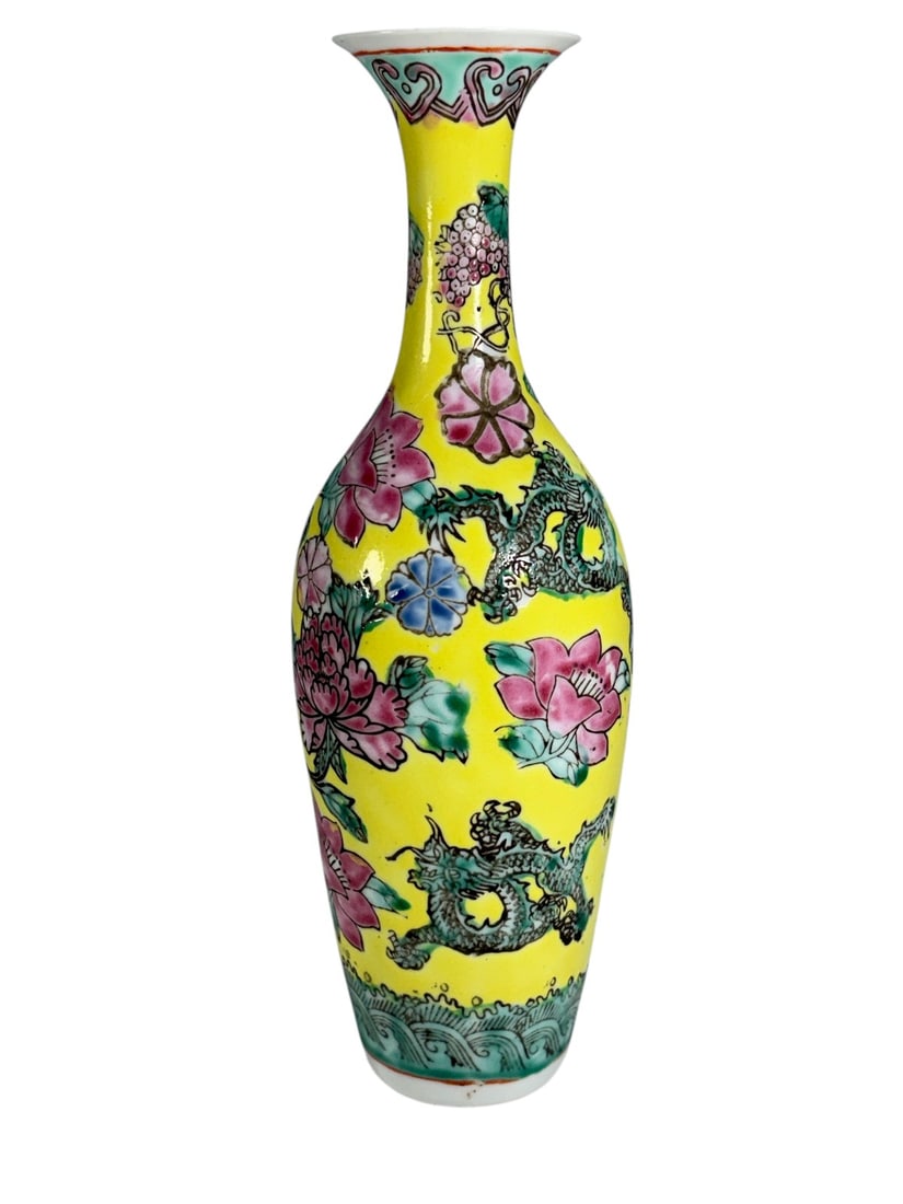 Chinese Eggshell Dragon Vase Qianlong Mark: Chinese eggshell porcelain vase decorated in the Famille Rose palette with five-clawed dragons among floral motifs on a bright yellow ground. Bears a six-character Qianlong reign mark to the underside