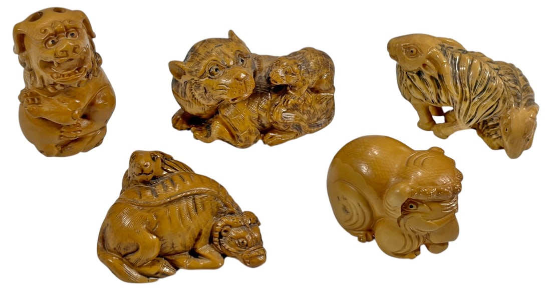 Japanese Style Carved Netsuke Animal 5pc LOT: Lot of five Japanese-style carved composition netsuke depicting various animal and mythical figures, including guardian lions (shishi), a turtle, and a rabbit. Each features carved details and