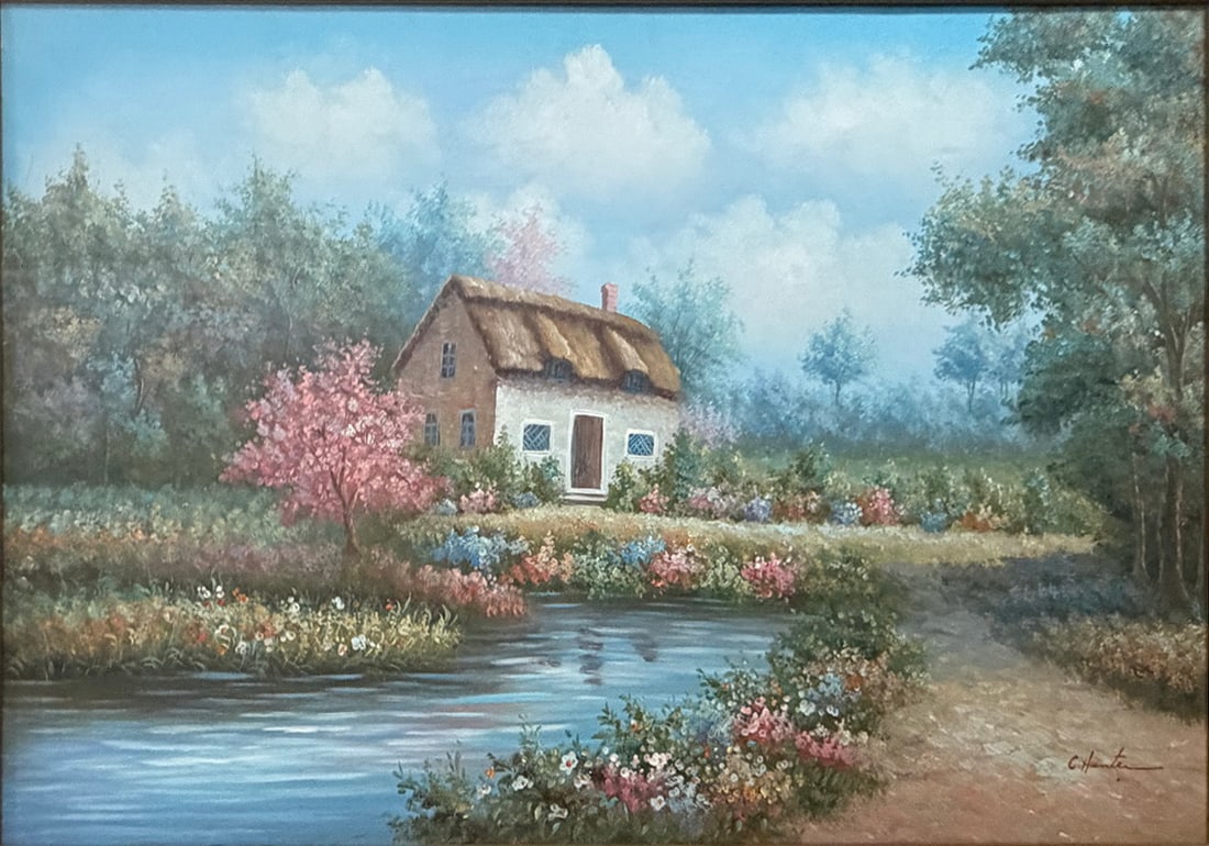 C. Hunter Signed Landscape Oil on Canvas Framed: Signed C. Hunter oil on canvas depicting a charming cottage beside a stream with lush gardens and flowering trees beneath a bright blue sky. Presented in a decorative wood frame. Work Size: 24 X 36 in
