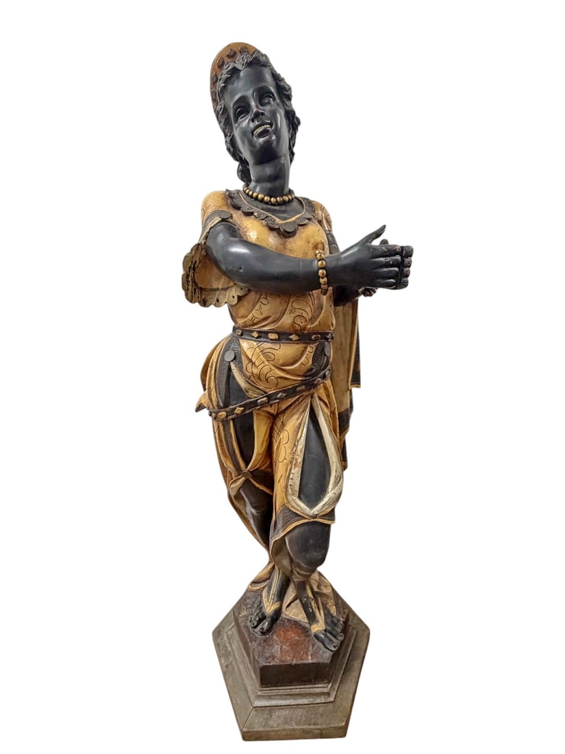 Large Balinese Carved Wood Female Figure Statue: Large hand-carved Balinese wood sculpture depicting a standing female figure in traditional attire with carved jewelry, elaborate drapery, and a two-tone polychrome finish. The figure is shown in a gr