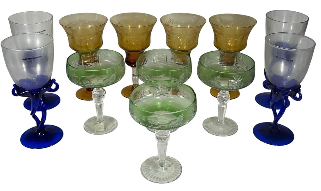 Jozefina Krosno Jellyfish & Polish Glass 12pc LOT: Lot of 12 Polish art glass stemware pieces. Includes four Jozefina Krosno "Jellyfish" wine glasses with clear bowls and sculptural cobalt blue stems, four amber etched goblets, and four green etched c