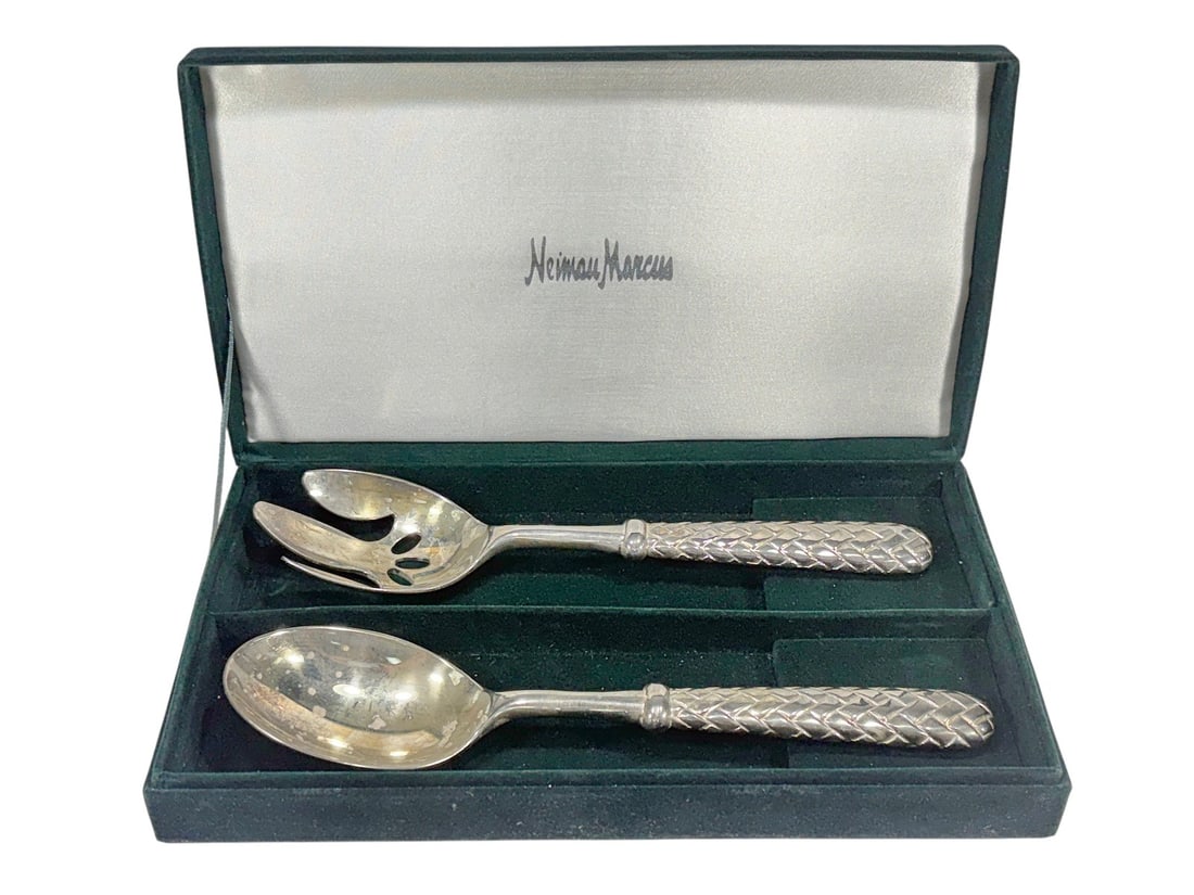 Neiman Marcus GSA 2pc Silverplate Salad Server Set: Neiman Marcus two pc silver tone salad serving set, consisting of a large serving spoon and pierced serving fork. Both feature decorative woven basket pattern handles. Each server measures approximate