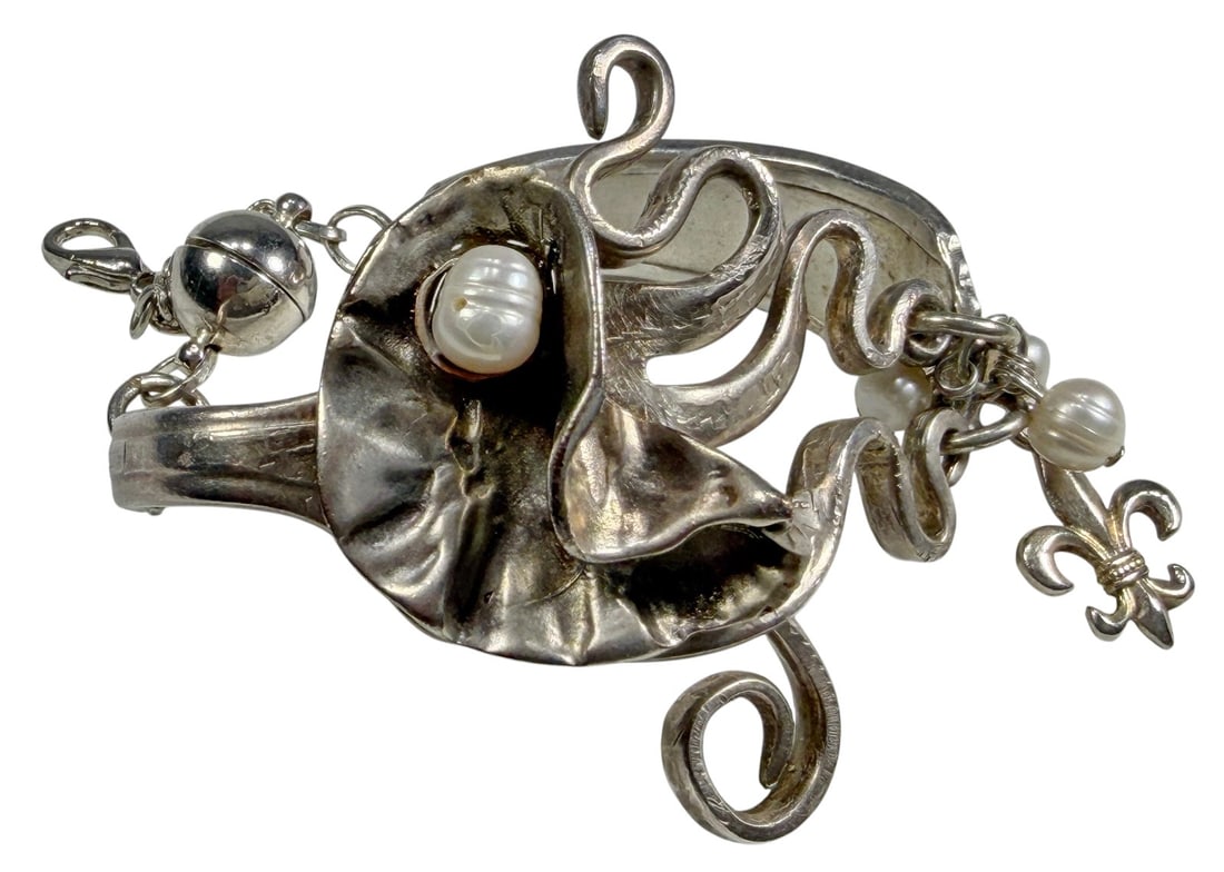 Sterling Silver Fork Octopus with Pearl Bracelet: Handcrafted sterling silver bracelet fashioned from a repurposed fork, featuring a sculptural octopus motif with curling tentacles and a cultured pearl accent. Additional decorative elements include