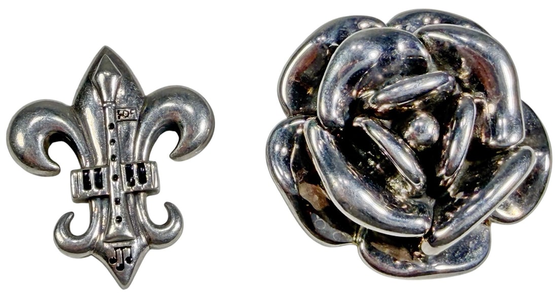 Sterling 925 Rose Pendant & Fleur de Lis Brooch 2p: Group of two sterling silver 925 jewelry pieces comprising a dimensional sculptural rose pendant and a fleur de lis brooch with engraved geometric detailing. The rose pendant measures approximately