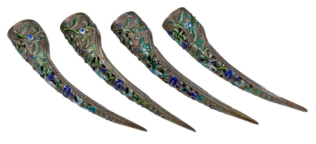 Chinese Low-Grade Silver Enamel Nail Guards 4pcs: Set of four Chinese curved fingernail guards crafted in low-grade silver, likely late Qing to Republic period. Each is decorated with pierced floral and bird motifs highlighted with polychrome enamel 