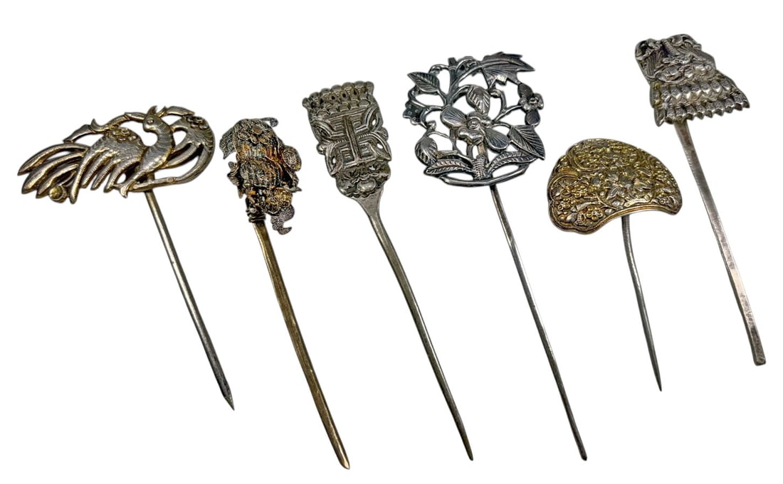 Chinese Figural Silver Ornamental Hairpins 6pc LOT: Set of six Chinese ornamental hairpins, some crafted in silver and others in low-grade silver, with varied pierced, repousse, filigree, floral, bird, figural, and auspicious motifs. One example featur