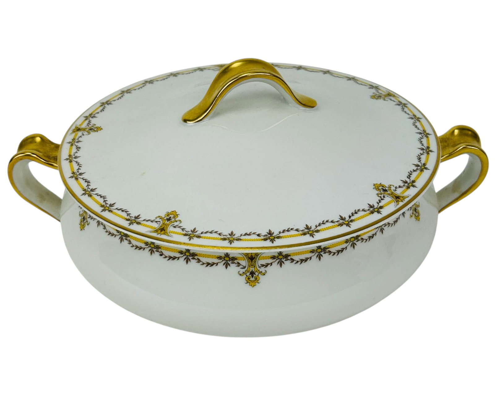 Haviland Limoges Porcelain Covered Casserole Dish: Haviland & Co. Limoges France porcelain table ware round lidded casserole. The white body feature gilt rims and handles with yellow and brown foliate garland borders and repeating scroll motifs.Unders