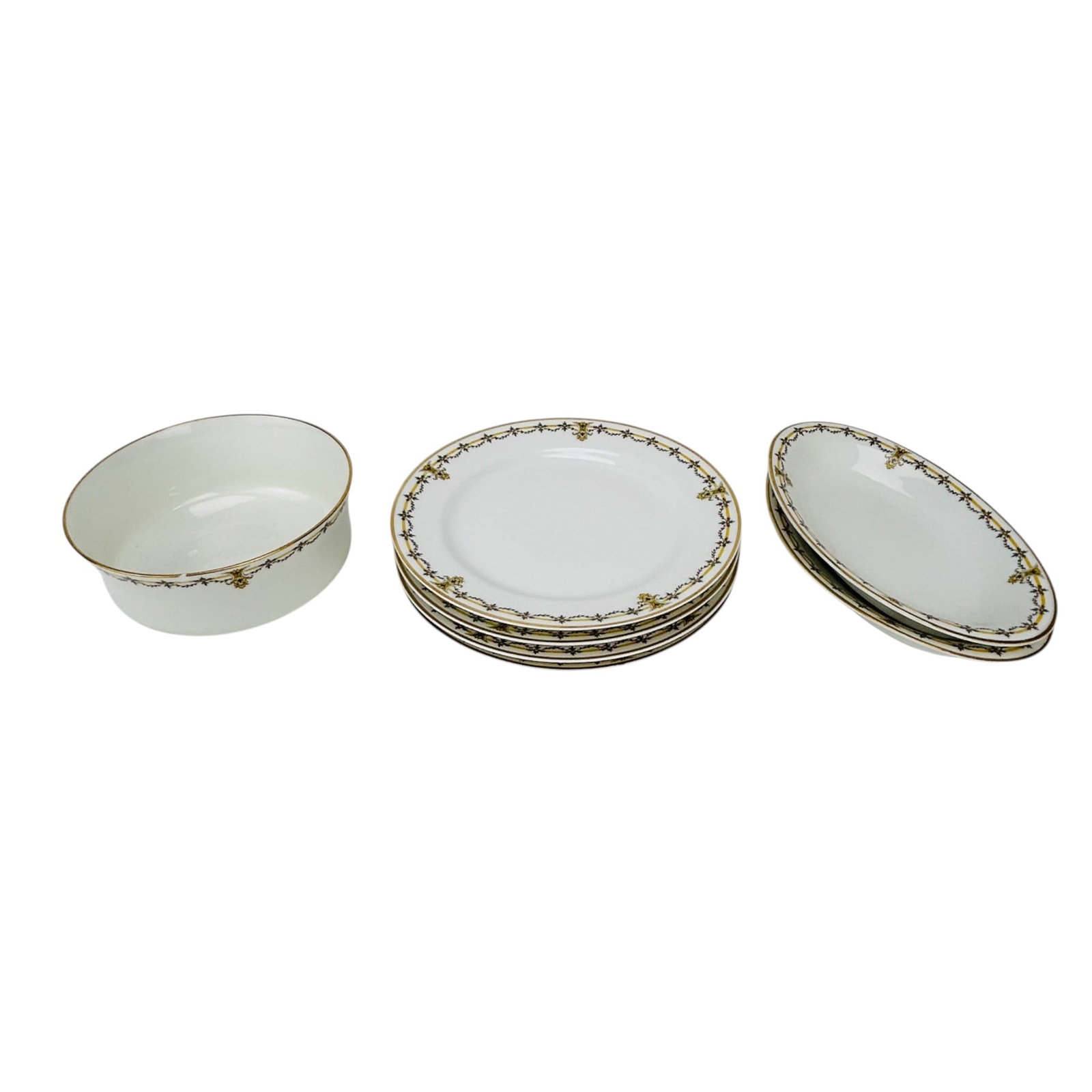 Haviland Limoges Porcelain Dish Plate & Bowl LOT: Haviland & Co. Limoges France porcelain table ware comprising four salad plates, two celery pickle oval dishes and a round bowl, total of seven pieces. The white bodies feature gilt rims with yellow a