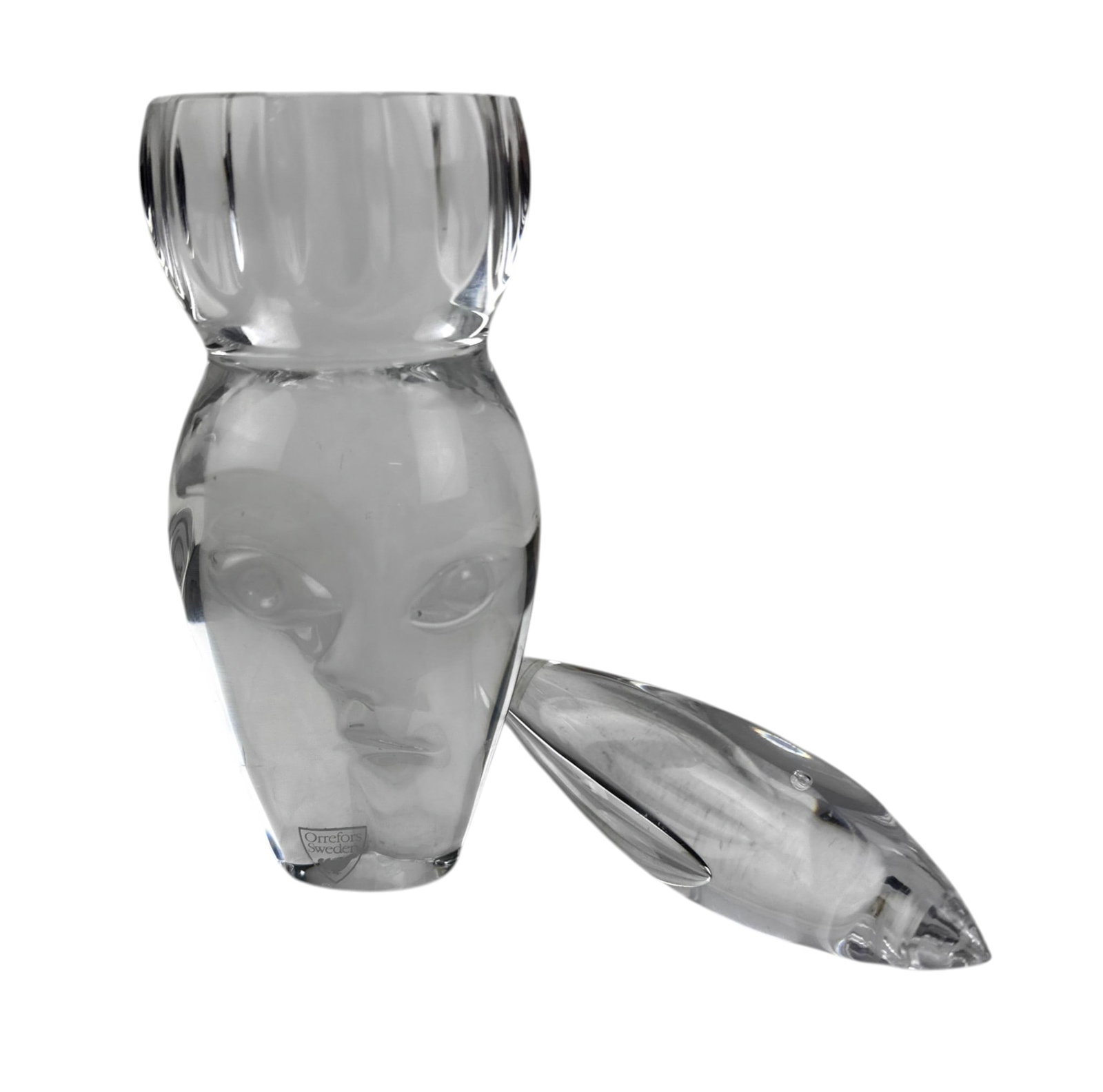 Orrefors & Kosta Boda Swedish Glass Sculpture LOT: Swedish art glass lot comprising an Orrefors clear crystal Sadeh Egyptian series figural head sculpture by artist Martti Rytkonen (Finnish, born 1960) and a Kosta Boda stylized fish sculpture by artis