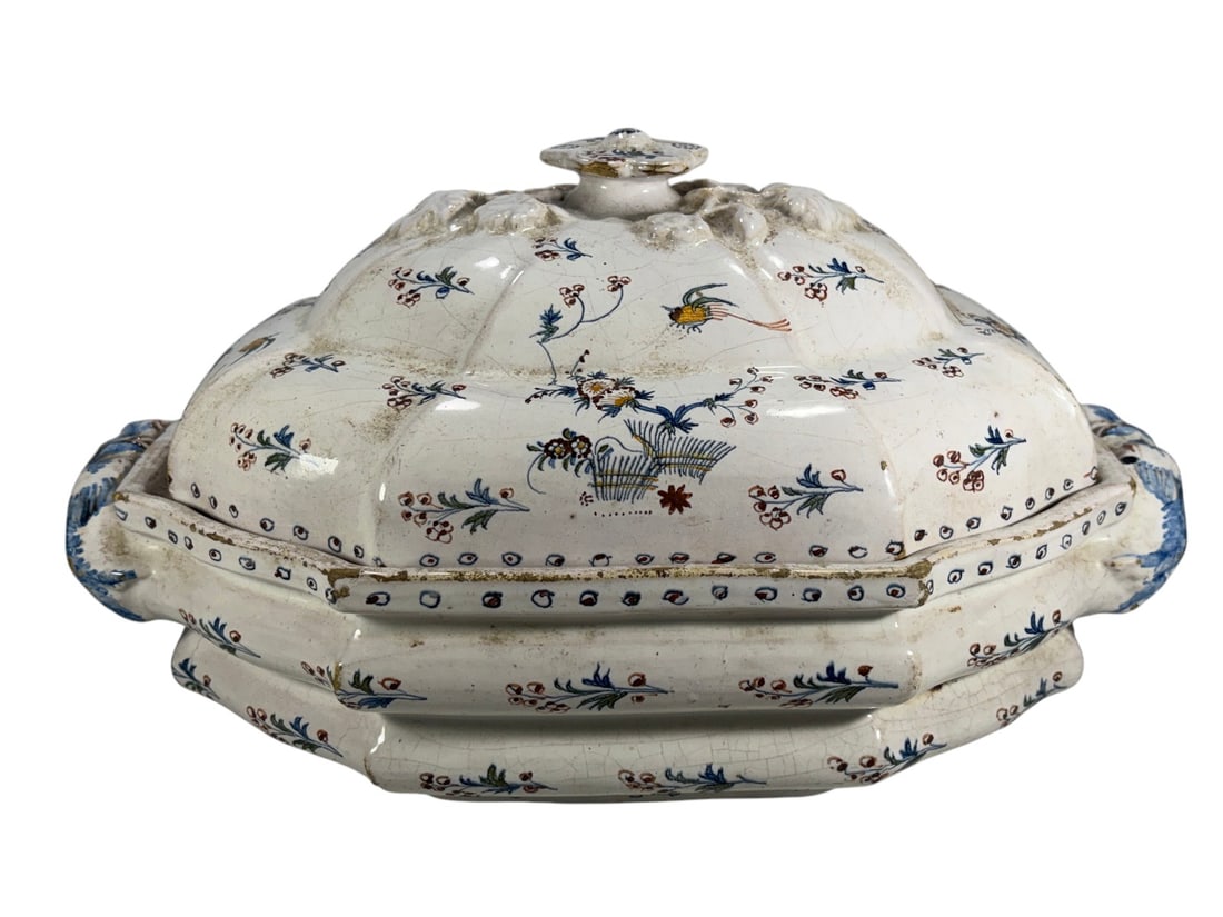 18th C. Rouen-Style Faience Covered Tureen: Large French or Continental faience covered tureen, likely 18th to early 19th century, of shaped octagonal form. Hand-painted in polychrome enamels of blue, iron-red, green, and yellow with scattered 