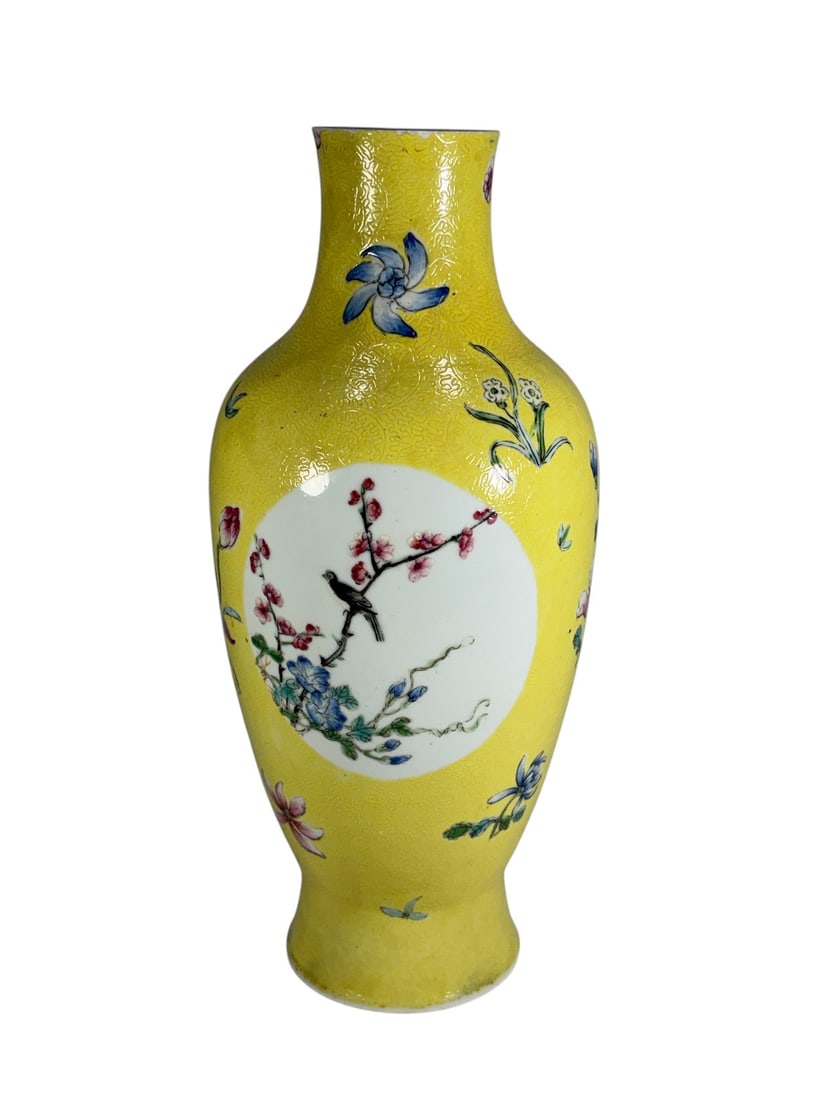 Chinese Style Yellow Ground Famille Rose Porcelain: Chinese style porcelain vase of baluster form with a yellow ground and molded or incised floral-pattern surface, decorated with polychrome flowers, birds, and circular reserves depicting flowering bra