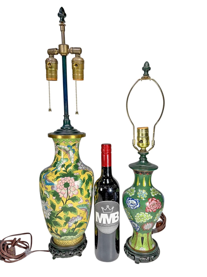 Chinese Floral Cloisonne Table Lamps 2pc LOT: Two Chinese cloisonne table lamps of baluster form, each decorated with colorful floral motifs. One with a yellow ground featuring butterflies among flowering branches, the other with a green ground d