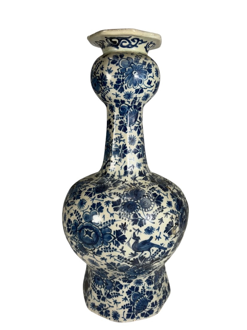 18th/19th C. Dutch Delft Double Gourd Vase 12.5": Dutch Delft blue-and-white pottery double gourd vase, dating to the 18th or 19th century. Of elongated double-gourd form with flared rim, hand-painted in cobalt blue with dense floral sprays,