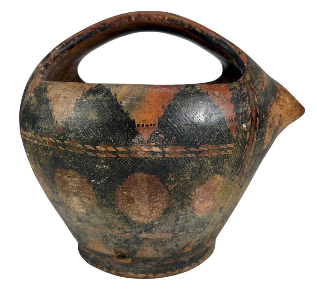 Early 20th C. Algerian Kabyle Terracotta Water Jug: Authentic early 20th-century terracotta water jug from the Kabylia region of Algeria, hand-built in the traditional Berber (Amazigh) pottery tradition. Of globular form with an integrated bridge