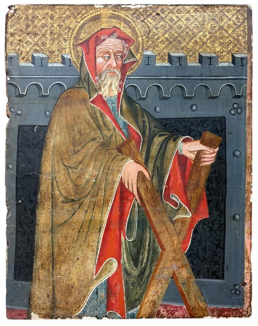 Hooded Saint w Saltire Gold-Ground Religious Panel: Striking religious panel painting depicting a bearded, hooded saint holding a saltire, or X-shaped cross, traditionally associated with Saint Andrew. The figure is shown before a crenellated