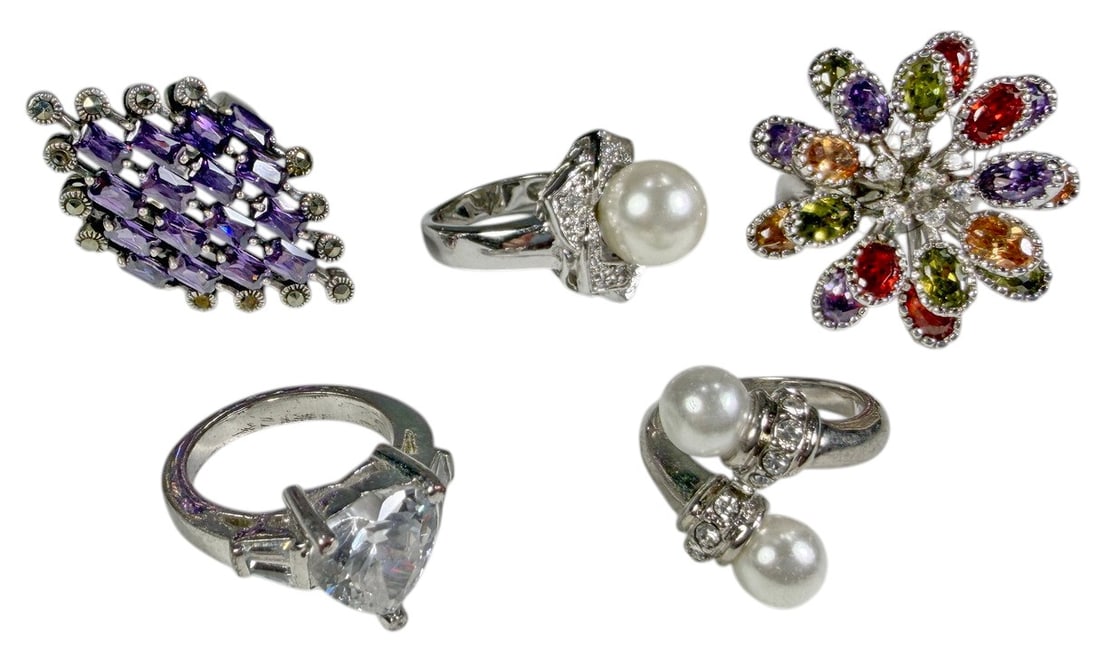 Assorted 925 Silver Gemstone & Pearl Rings 5pc LOT: A lot of five sterling silver rings in assorted decorative designs. The group includes a rectangular purple stone cluster ring with marcasite-style accents, a colorful floral cluster ring with