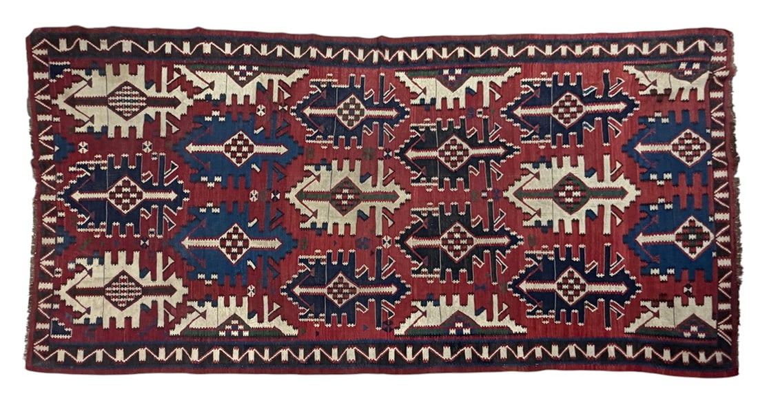 Antique Turkish Malatya Geometric Kilim Area Rug: Antique Malatya kilim rug from Turkey, handwoven in a traditional flatweave technique. Features bold geometric and tribal motifs in red, navy blue, cream, green, and dark brown tones, arranged in repe