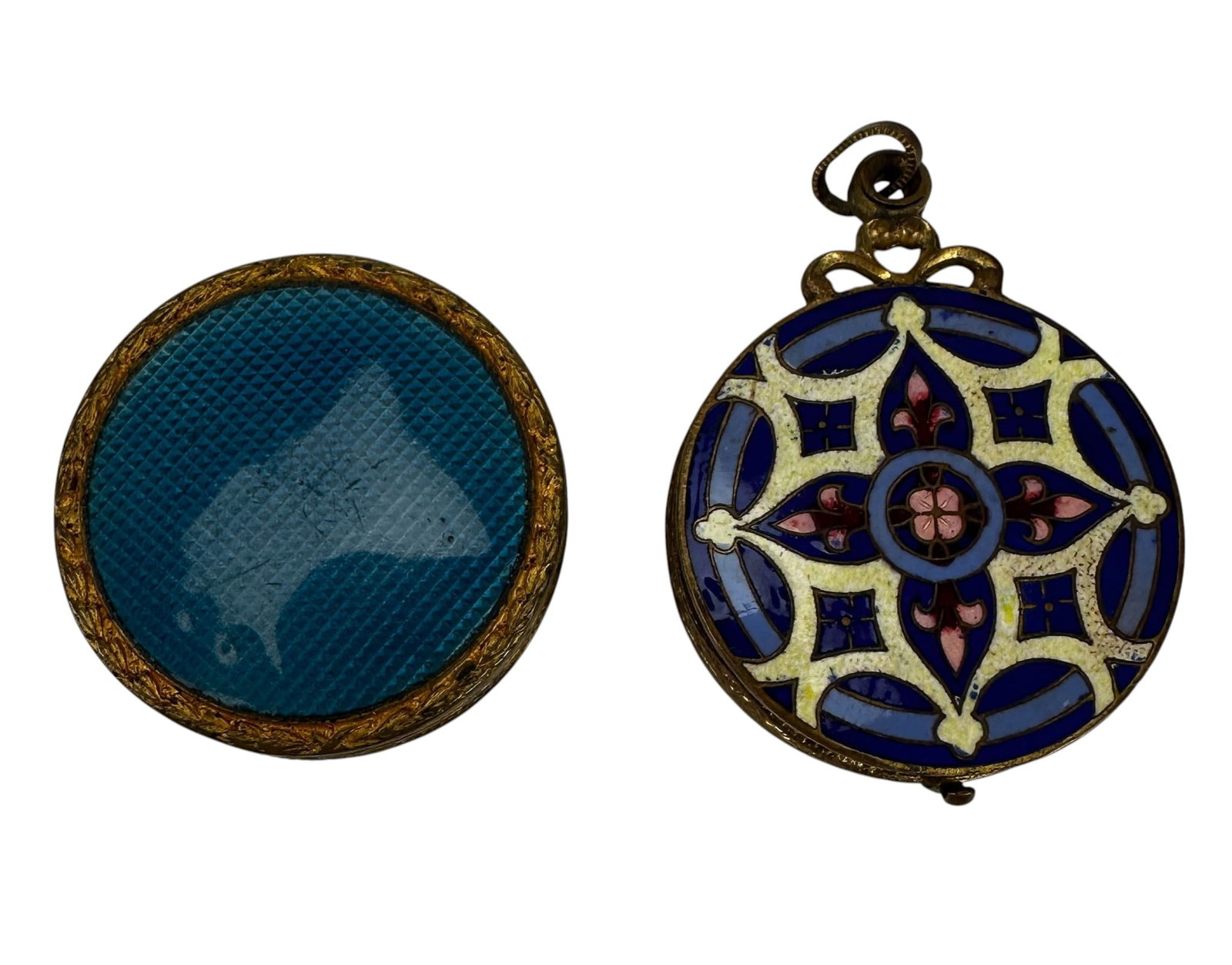 Antique Enamel Floral Compact & Locket Pendant LOT: Two round gilt metal enamel accessories comprising a hinged compact and a pendant locket. Compact features a hand-painted floral bouquet on white enamel surrounded by a turquoise border with gilt