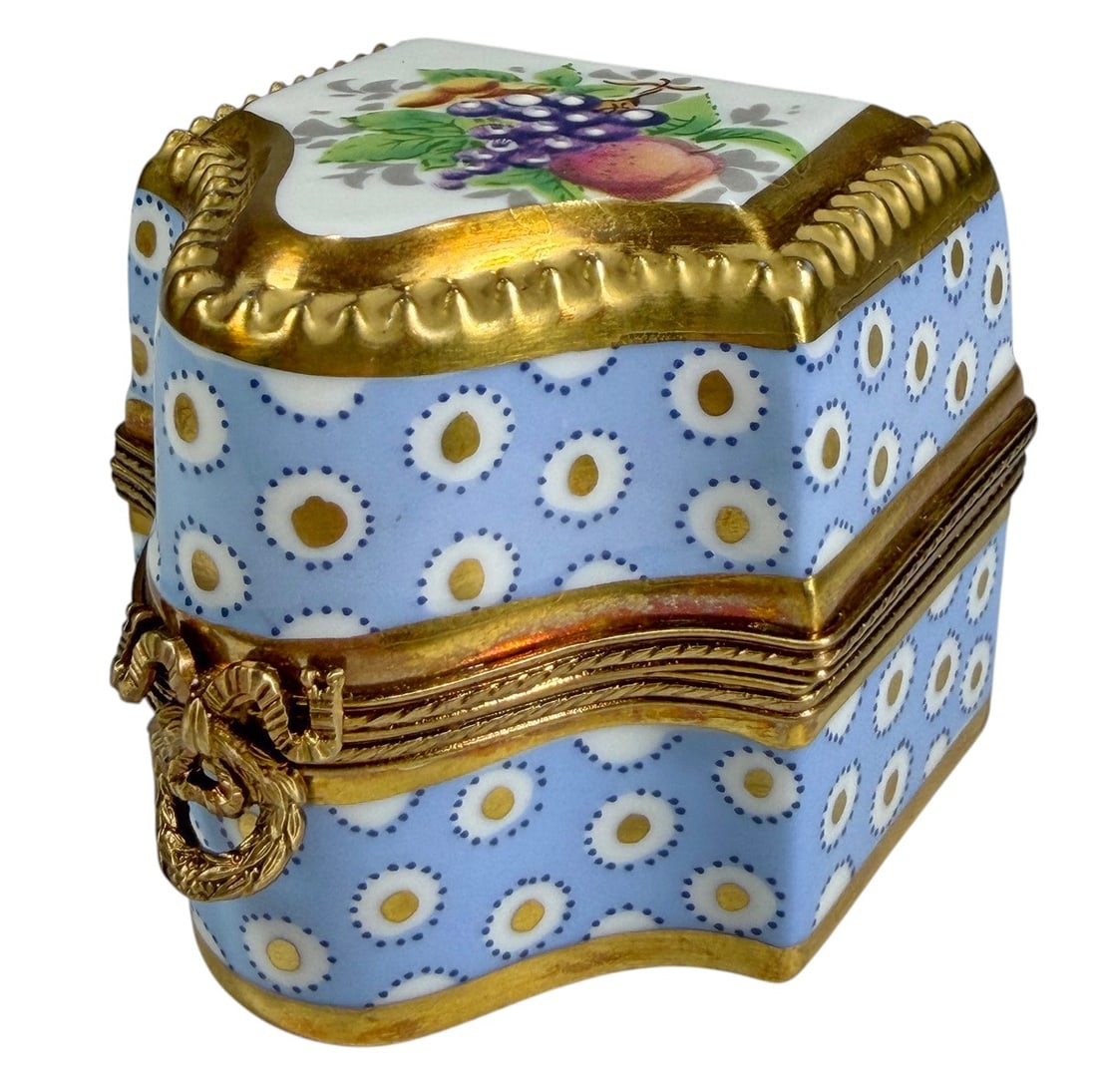 Limoges France Porcelain Blue Floral Perfume Box: Decorative Limoges France porcelain hinged trinket box designed to hold three miniature perfume bottles. The box features a pale blue ground with repeating floral motifs, extensive gilt decoration, an