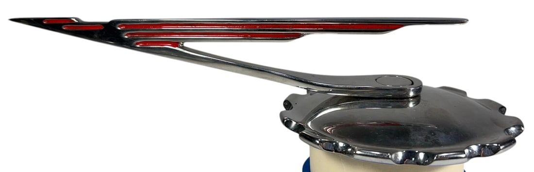 Duesenberg Style Dusenbird Radiator Mascot: A dramatic Art Deco-style automobile radiator mascot commonly known as the Dusenbird, associated with Duesenberg-inspired motoring accessories. The streamlined ornament features a long, sharply