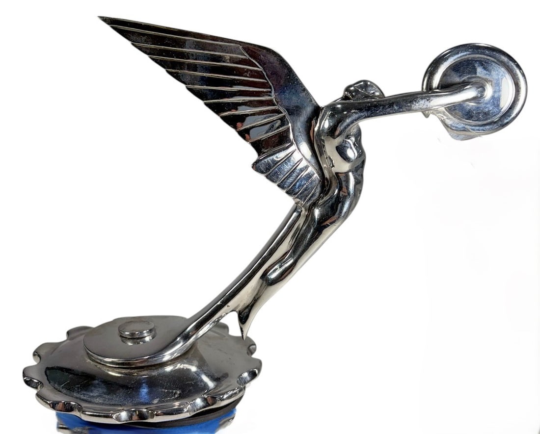 Large 1928 Isotta Fraschini Radiator Mascot: A large Art Deco automobile radiator mascot associated with Isotta Fraschini, circa 1928. The chrome-plated sculptural figure depicts a streamlined winged female form with elongated body, raised