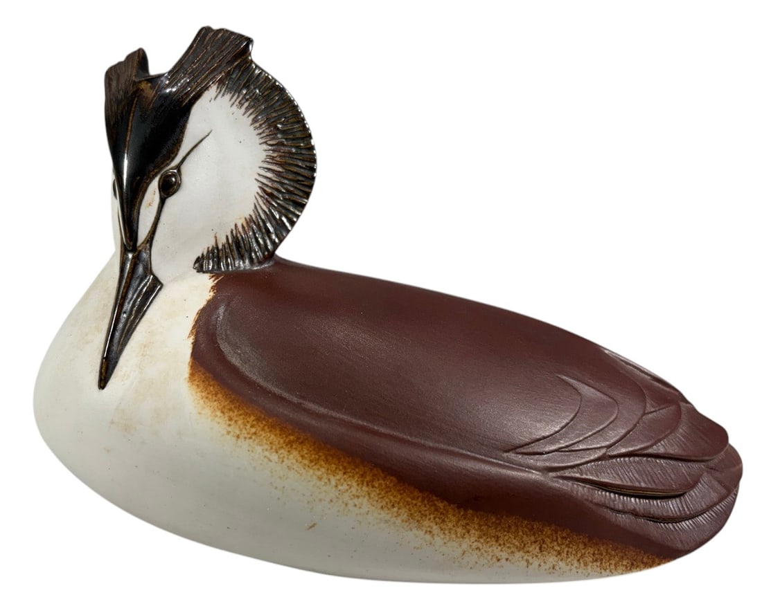 Paul Hoff Gustavsberg Grebe Bird Figurine, Sweden: Swedish ceramic bird figurine depicting a great crested grebe, designed by Paul Hoff for Gustavsberg. Naturalistically modeled with brown, cream, and black coloration. Underside impressed