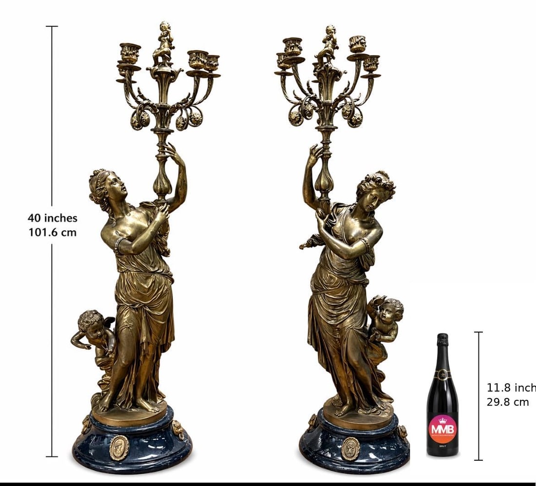 Pair 19th C. Barbedienne Style Bronze Candelabras: Pair of 19th-century neoclassical bronze candelabras with female figures and putti supporting five-light foliate branches, on dark marble bases with gilt mounts. Finely cast with Barbedienne-quality d