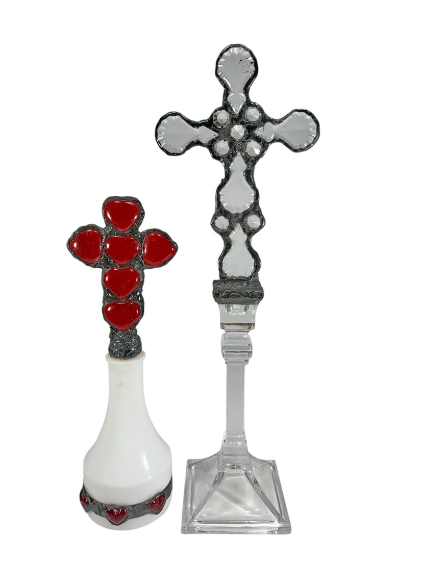 Belgian Jeweled Glass Pedestal Crosses 2pc LOT: Two-piece lot of Belgian decorative crosses with applied faceted glass elements. One cross features red heart-shaped glass decoration and is mounted on a white glass bottle-form base with additional