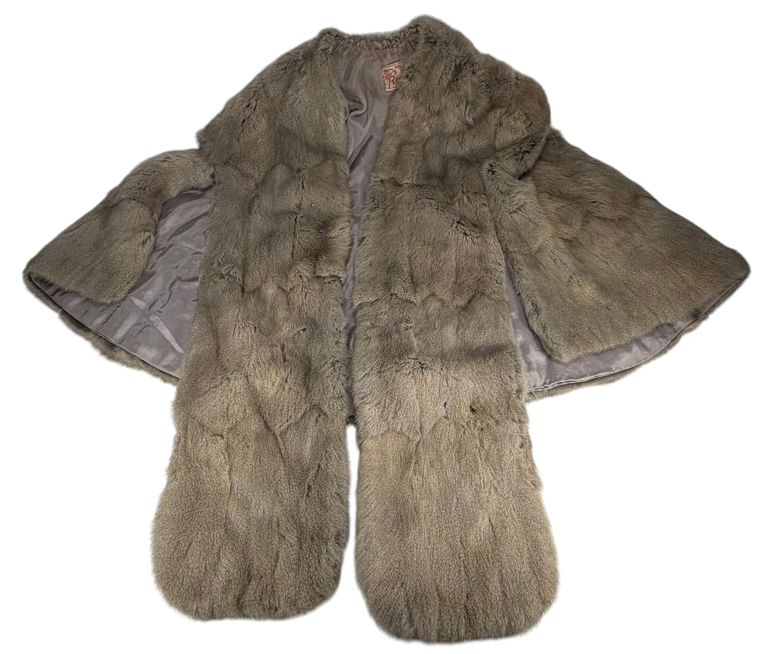 Vintage Rechter Bogota Natural Fur Capelet Wrap: Vintage natural fur capelet or shoulder wrap by Rechter Bogota, Colombia. Crafted from soft taupe-toned natural fur with darker highlights and a wide rounded silhouette designed to drape across the