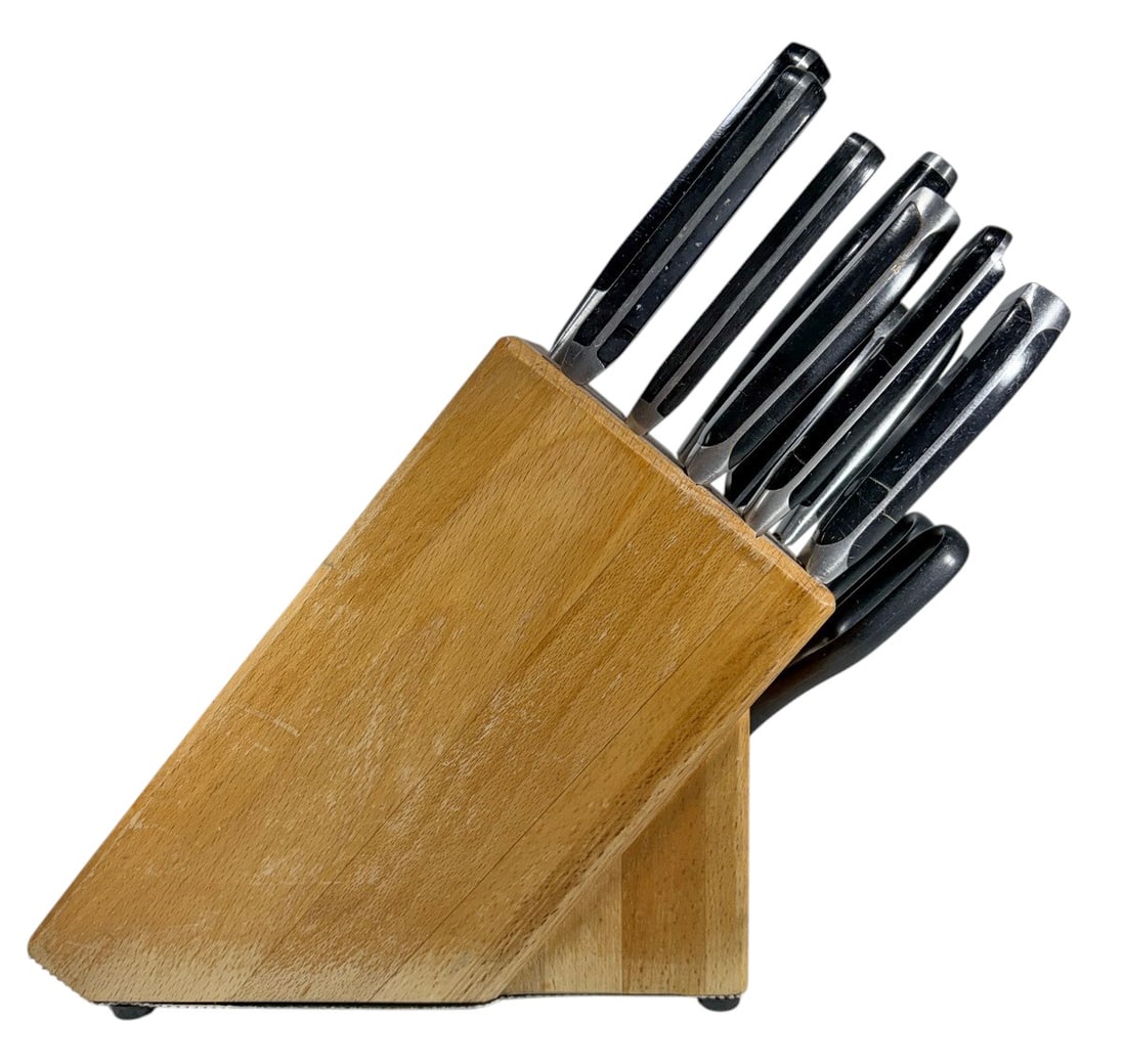 Mixed Knives & Scissors in Henckels Block 10pc LOT: Assorted kitchen knife group comprising nine knives and one pair of kitchen scissors, housed in a J.A. Henckels wooden knife block. One knife is marked J.A. Henckels, matching the maker of the block;