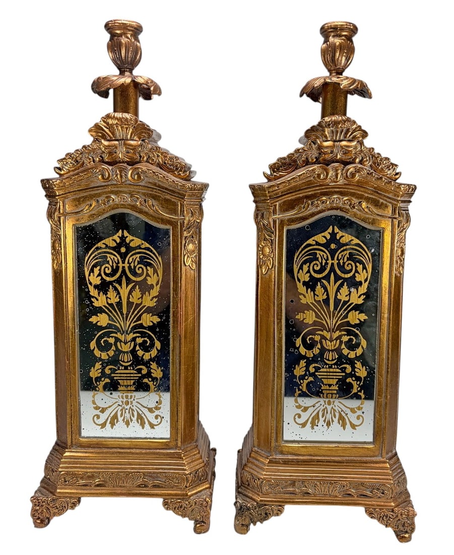 Gilt Resin Mirrored Floral Candelabra 2pc LOT: Two-piece lot of decorative gilt resin candelabra, each featuring an architectural-form body fitted with mirrored panels decorated with gilt floral, foliate and urn motifs. The ornate frames feature