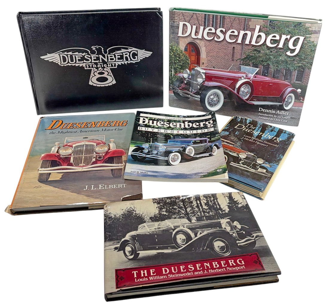 Assorted Duesenberg Motor Car Books 6pc LOT: A group of six illustrated collector reference books devoted to Duesenberg automobiles. Titles include Duesenberg: The Mightiest American Motor Car by J. L. Elbert, Duesenberg by Dennis Adler,