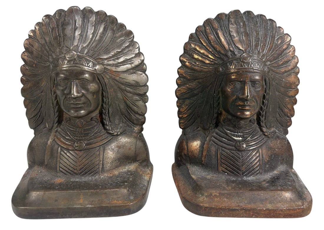 Native American Chief Cast Metal Bookends 2pc LOT: Two-piece lot of cast metal bookends modeled as Native American chiefs wearing feathered headdresses and traditional-style attire. Each figure is mounted on an integral rectangular base and finished