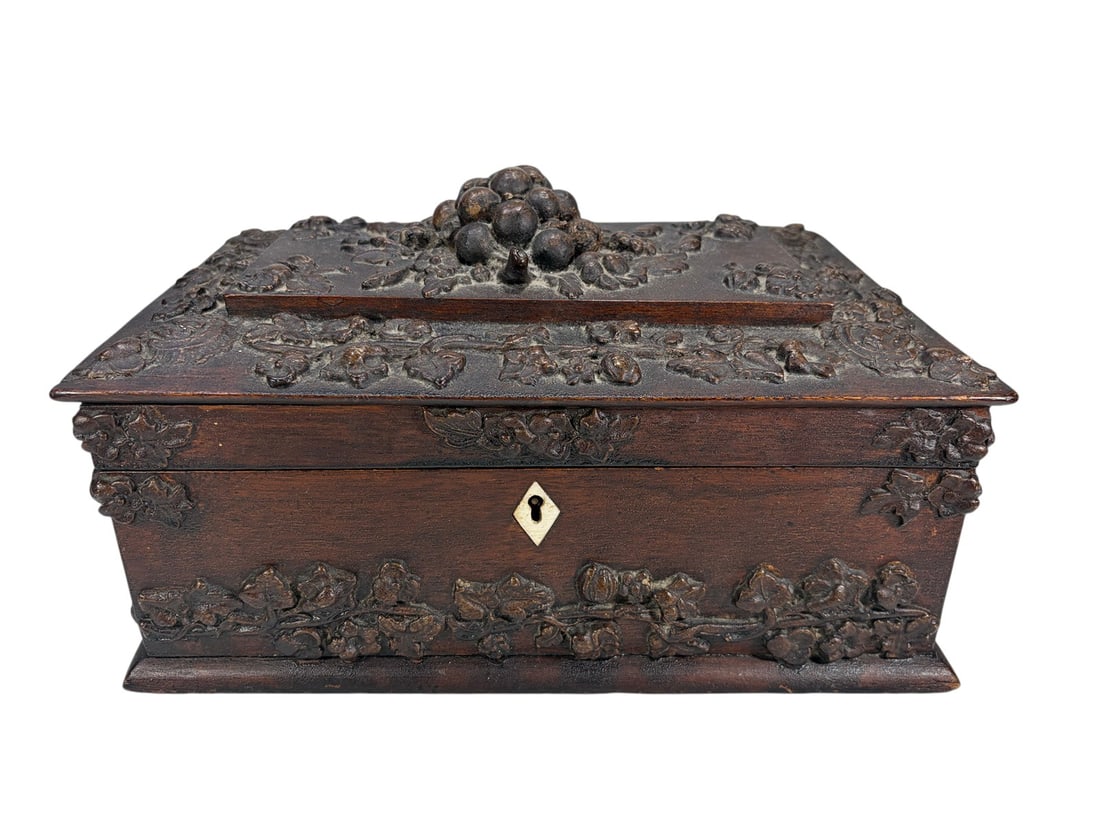 Rectangular Lidded Wood Box w/ Composition Grape: Rectangular wood decorative box with a hinged lid, embellished with applied composition relief decoration depicting grape clusters, vines, leaves, and floral motifs. The lid features a prominent three