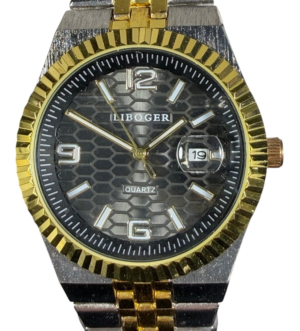 Designer Inspired Two-Tone Quartz Wristwatch: Two-tone quartz wristwatch by Liboger, featuring a silver-tone case and bracelet with gold-tone center links and a fluted gold-tone bezel. The black textured dial includes applied hour markers, Arabic