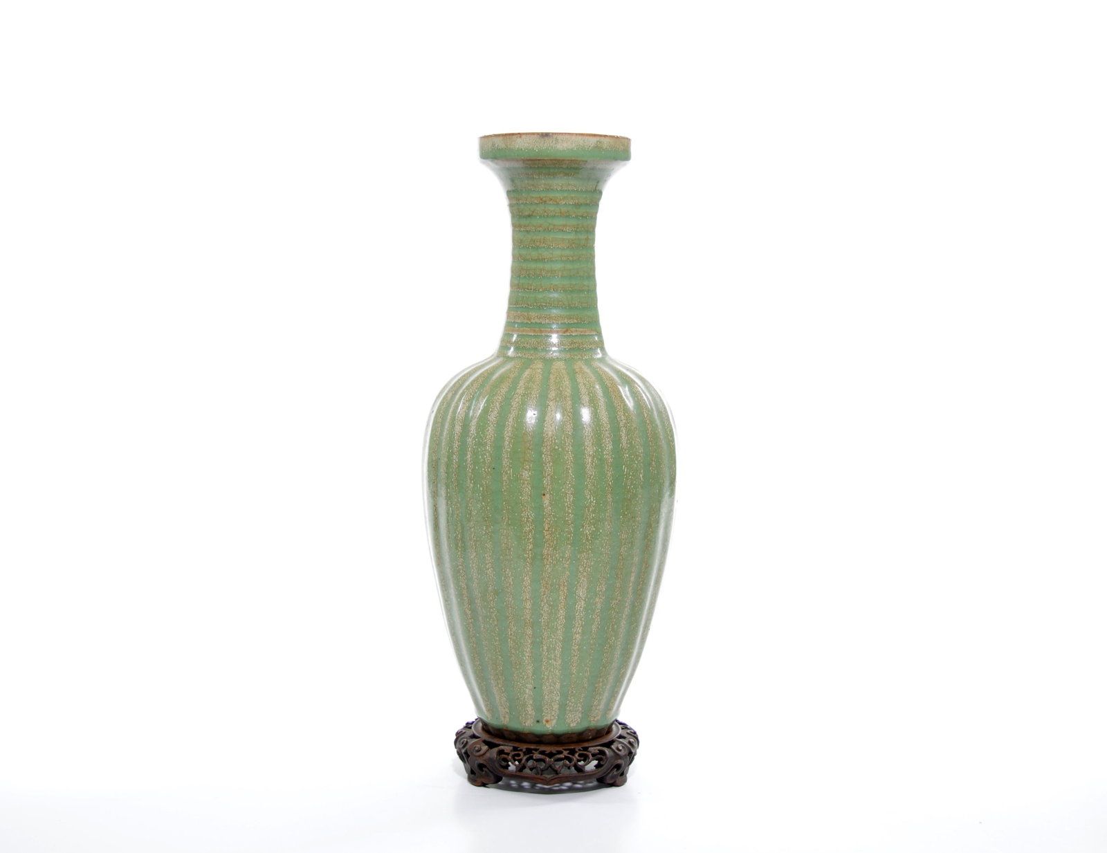 A Fine Chinese Porcelain Vase: Tall vase rising from foot to a narrow long neck with lobed body covered in sea green glaze. Possibly Ming dynasty. H: 12 3/4 inches