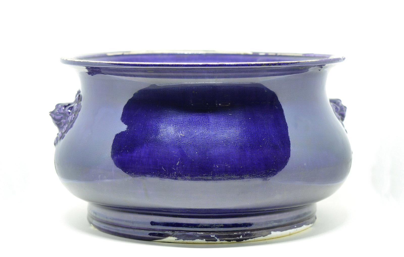 Chinese Kangxi Aubergine Incense Burner: Very finely potted burner decorated with pair of lion masks, cover over all with bright and even aubergine tone, loss of enamel and one hairline crack, Kangxi period. D: 22CM, 8 3/4 INCHES Provenance:
