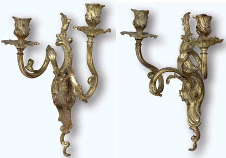 Bronze Sconces: Pair of two-light sconces, in chased and gilded bronze. H: 36cm