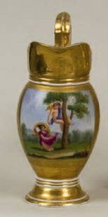 Porcelain Pitcher: Polychrome and gold decoration representing two cupids picking apples. . H. 20 cm