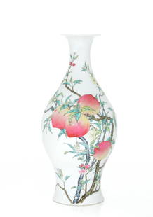Very Fine Chinese Famille Rose 'Peach' Vase: Elegantly potted with a gently rounded body, tapering towards a slightly spreading foot, painted with an asymmetric design of two peach branches growing around the vase and wrapping around the neck, d