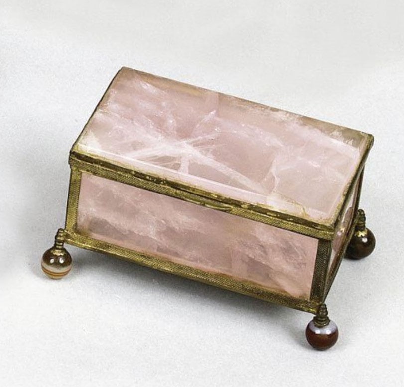 Rose Quartz Box: Rose quartz and hardstone box in a brass cage mount, resting on agate ball feet.L: 23 cm