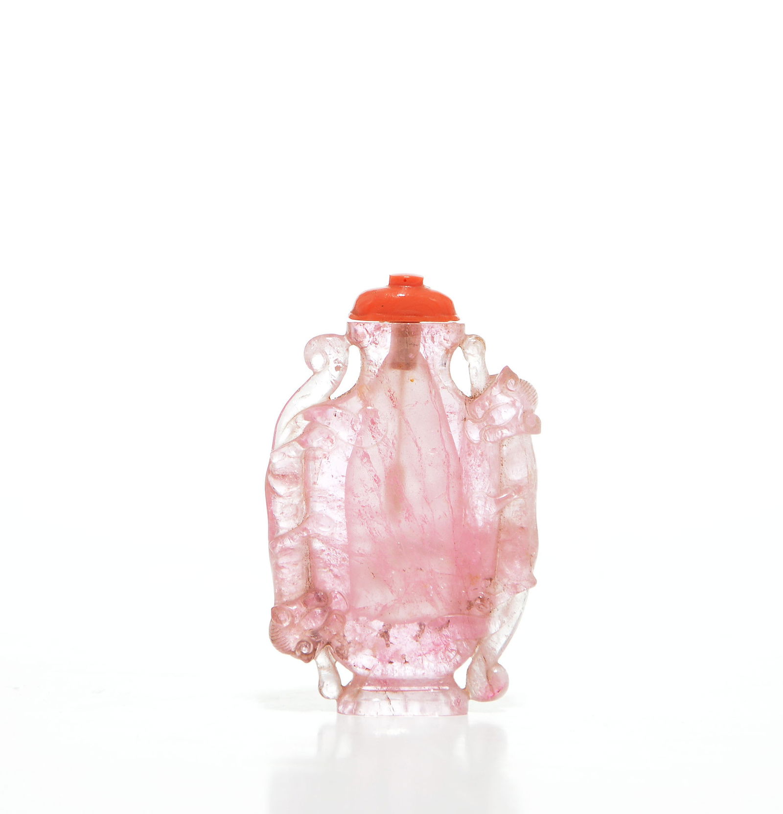 Imperial Chinese Tourmaline 'Dragon' Snuff Bottle: Out of a single block of translucent pink tourmaline, featuring a flattened ovoid body flanked by high-relief crawling dragons (chilong) on the narrow sides. The vibrant rose-colored stone displays ch