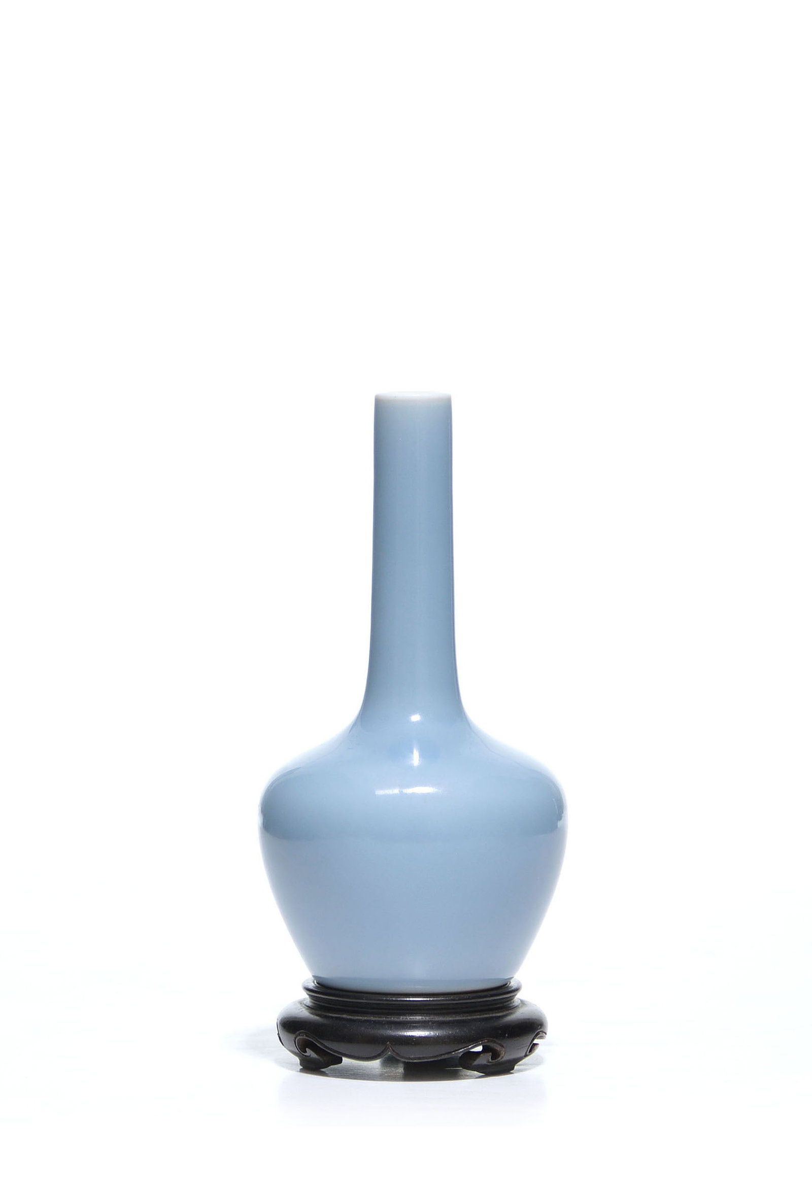 Rare Chinese Clair-de-Lune Porcelain Vase: Bottle vase of refined silhouette, the well-potted compressed globular body rising to a tall, columnar neck. Covered overall in an even, sky-blue glaze of soft, lustrous quality, the vessel